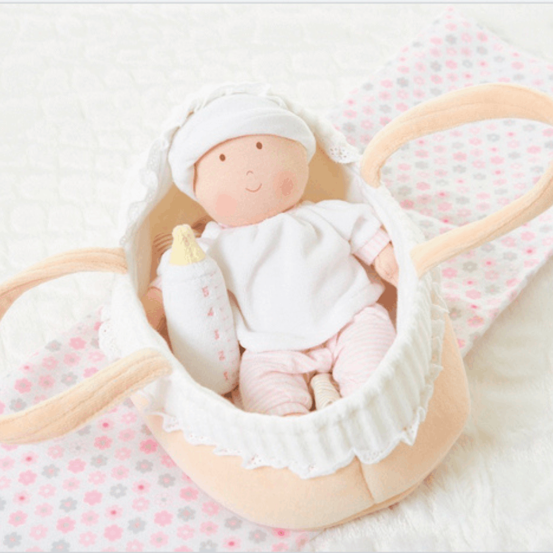 Bonikka Baby doll in carrying basket